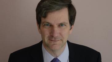 A headshot of Professor Ifor Samuel