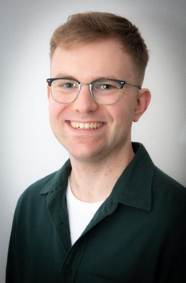 A headshot of Dr Alex Browne