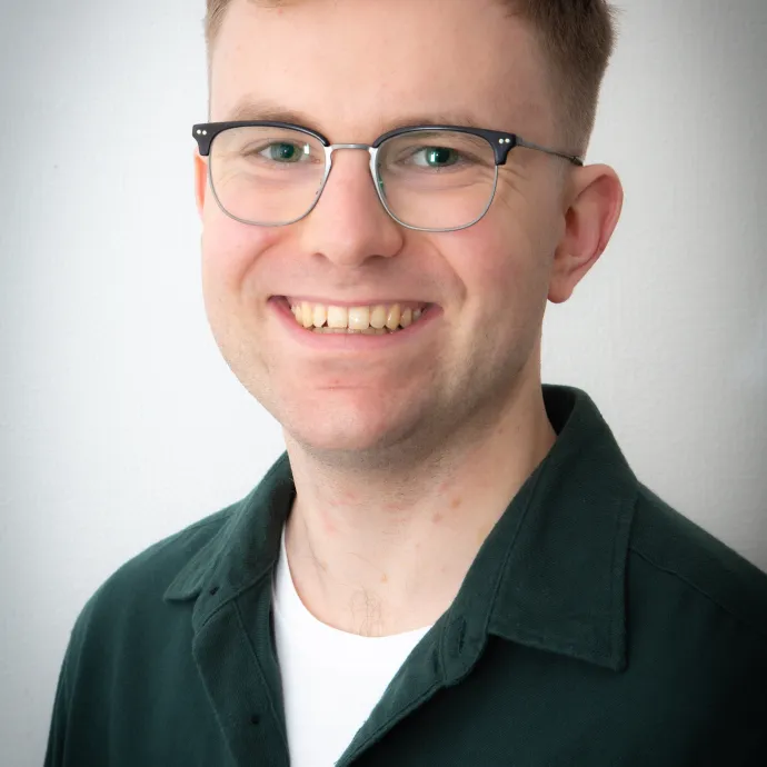 A headshot of Dr Alex Browne